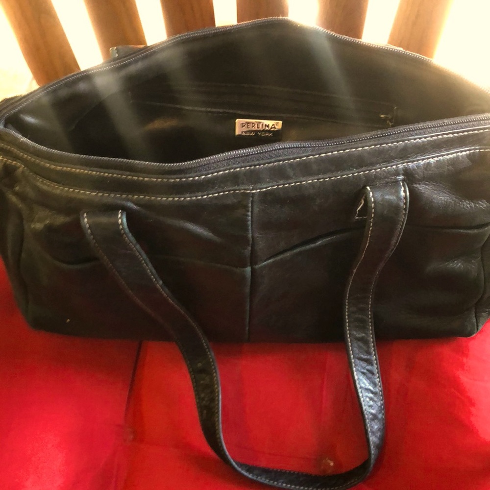 Perlina beautiful black leather inside and out.